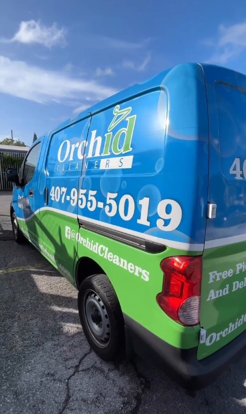 Orchid Cleaners Orlando dry cleaning delivery van.